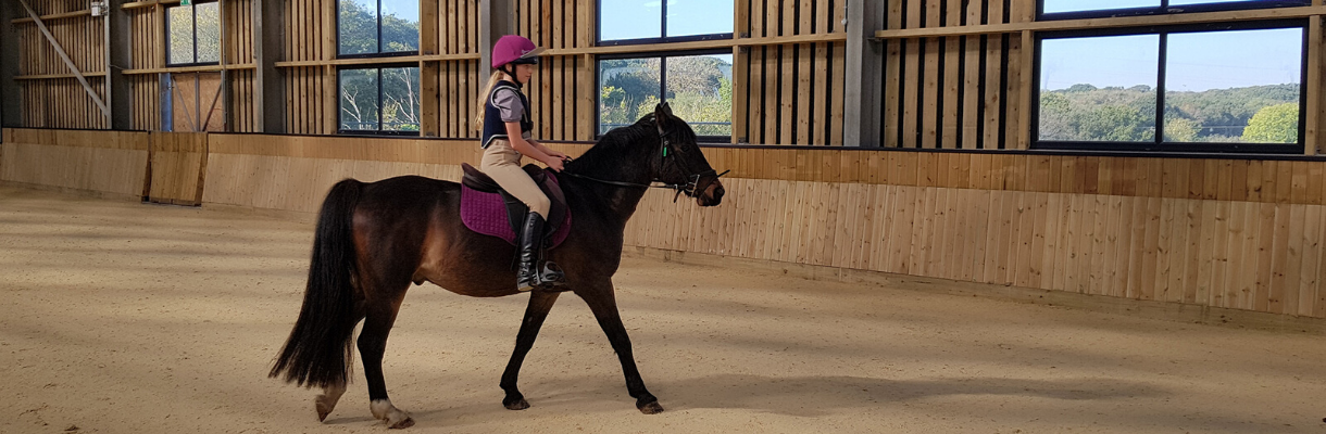 Horse riding indoors